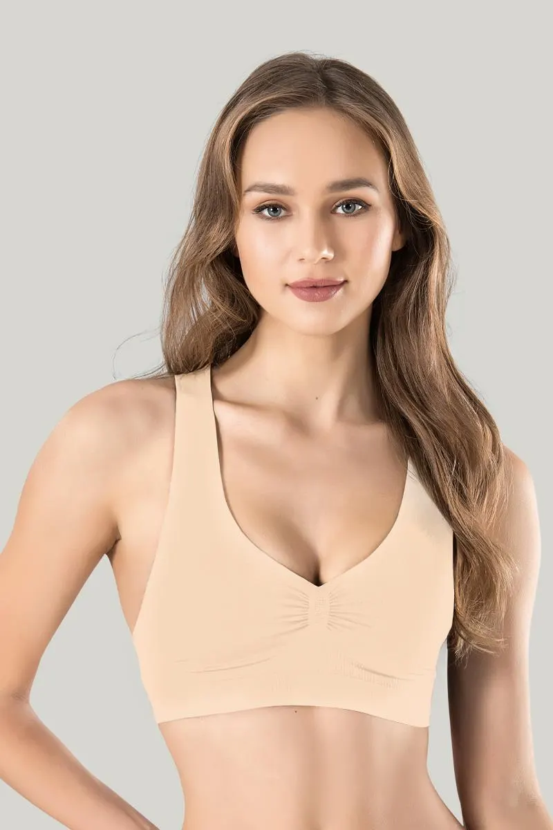 Bustieră sport damă Miss Fit elastică, cu bretele late, fără cusături și spate racerback, bej